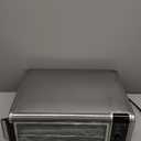 Ninja Digital Air Fry Countertop Oven, 8-in-1 Functionality, 1800W, Flip-Up Design, XL Capacity, Air Fry Basket, Wire Rack & Crumb Tray, Silver, SP101