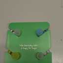 Tommee Tippee Ultra-Light Silicone Pacifier, 6-18 Months, Symmetrical One-Piece Design, BPA-Free Silicone Binkies, Clear/Blue/Yellow, Pack of 4