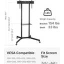 Heavy-Duty Rolling TV Stand for 3285" Screens  Supports 187 lbs (154 lbs TV + 33 lbs Shelf), Stable Mobile TV Cart with Shelf & Locking Wheels, Floor TV Stand, Max VESA 600x400, Black