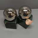Deco 79 CosmoLiving by Cosmopolitan Marble Orb Bookends, Set of 2 4" W, 7" H, Silver