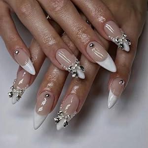 French tip Press on Nails Medium Almond Fake Nails with Design Metal 3D Bow Charms Stick on Nails White Pearl Glue on Nail Stiletto Nude Acrylic Nail Reusable for Women Girls Manicure
