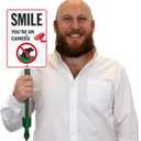 SmartSign 'Smile You're On Camera' Yard Sign with No Dog Poop Symbol - 7" x 10" Sign with Sturdy Stake, 40 mil Aluminum Sign, 21-inch Tall Sign/Stake Kit, Green/Black/White, USA-Made