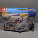 Hot Wheels Toy Car Track Set, Deluxe Building Box with Motorized Booster, 1:64 Scale Vehicle, Speed Snap Track, Boosted Jump Speedway