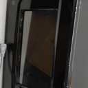 GE GCST14S1WBB 1.4 Cu. Ft. Black Countertop Microwave (Door stock can't open)
