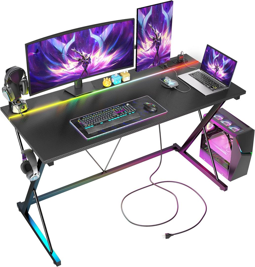 TIQLAB Gaming Desk with Power Outlets & LED 47 Inch Ergonomic Computer Carbon Fiber Surface Gamer Desk, PC Workstation with Headphone Hook for Bedroom, Kids Desk Gift for Boys, Black