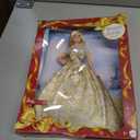 Barbie Signature Doll, 2025 Holiday Blonde Fashion Doll Wearing Silver & Gold Gown, Seasonal Collector Doll in Displayable Packaging & Doll Stand