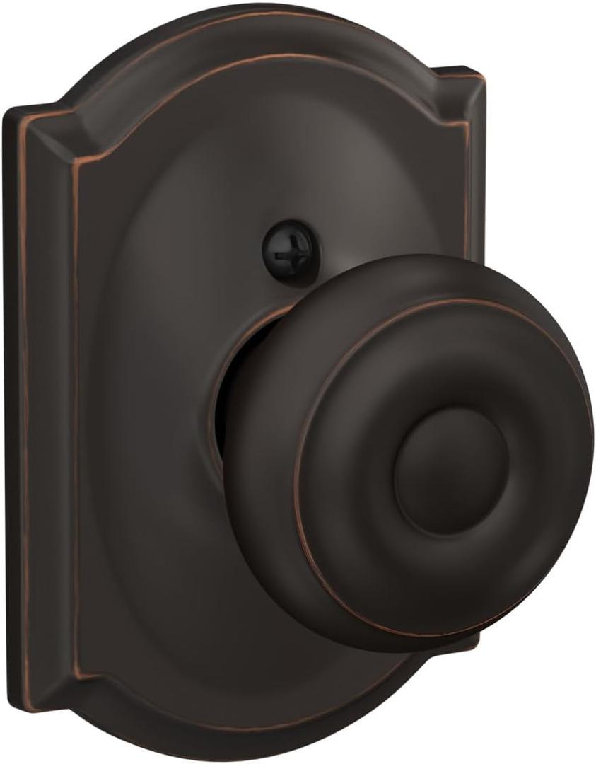Schlage F170 GEO 716 CAM Georgian Door Knob with Camelot Trim, One Sided Non-Turning Dummy Door Handle, Aged Bronze Schlage F170 GEO 716 CAM Georgian Door Knob with Camelot Trim, One Sided Non-Turning Dummy Door Handle, Aged Bronze