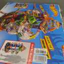 Hot Wheels City Robo T-Rex Ultimate Garage Multi-Level Multi-Play Mode Stores 100 Plus 1:64 Scale Cars Gift idea for Kids 3 and Older, Large