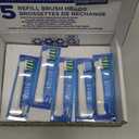 OralB CrossAction Electric Toothbrush Replacement Brush Heads, Black, 4 Count + 1 Sensitive White