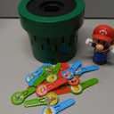 TOMY Pop Up Super Mario Game - Activities for Indoor Recess or Family Game Night - Officially Licensed Super Mario Toys for Kids - Easter Basket Stuffers - 2-4 Players - Ages 4 Years and Up