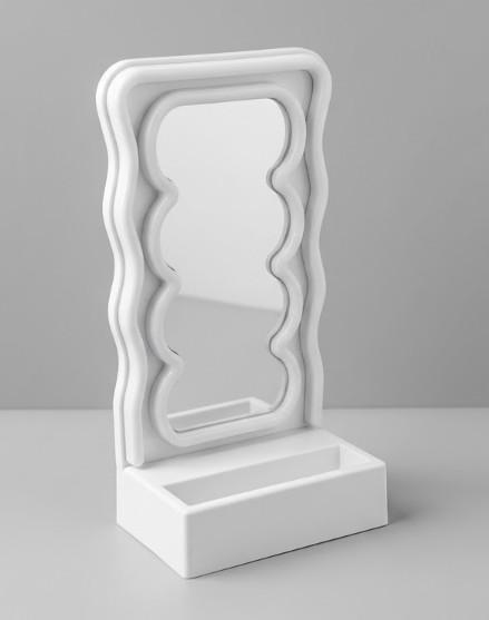 Orbit Wavy LED Light and Mirror Phone Holder is a multifunctional phone stand featuring a vibrant LED glow, a built-in mirror, and a trendy wave design for hands-free viewing