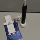 Oral-B iO Series 2 Rechargeable Electric Powered Toothbrush Starter Kit, Night Black with 2 Brush Heads - Automatic Pressure Sensor to Protect Gums - 3 Modes - 2 Min Timer