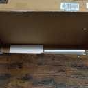 VASAGLE Kitchen Bakers Rack with Power Outlet, Coffee Bar 4-Tier with 8 S Hooks, Microwave Stand, Adjustable Shelf, for Small Spaces, Rustic Brown and Ink Black UKKS014K01V1 (23.6"W)