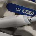 Oral-B Rechargeable Electric Toothbrush, iO3 Limited Deep Clean, 3 Cleaning Modes, Visual Pressure Sensor to Protect Gums, 2 Brush Heads, Travel Case, White