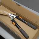 Fiskars Power-Lever Extendable Hedge Shears, Self-Sharpening Serrated Steel Blades for Clean Cuts, Handles Adjust 25"-33" for High Reach, Multiplies Leverage for 2x Power, 10" Blades, Orange/Black