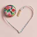 RIFLE PAPER CO. Garden Party Measuring Tape - Retractable Measuring Tape in Illustrated Case, Brass Hardware and Hidden Button Release, Measures up to 60" (152.4 CM), Stows Easily and Discreetly