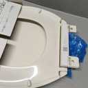 KOHLER 20110-96 Brevia, Slow Close Toilet Seat, Elongated Toilet Seat, Grip-Tight Bumpers Quick-Attach Hardware, Biscuit