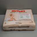 Huggies Size 2 Diapers, Skin Essentials Baby Diapers, Size 2 (12-18 lbs), 192 Count (3 Packs of 64)