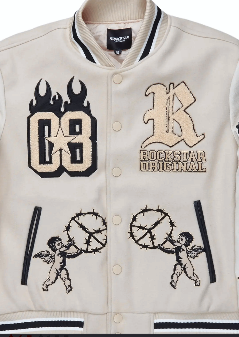An urban collegiate varsity jacket for women in beige. Designed with an ultra soft fleece body and contrast faux leather sleeves for a trendy outerwear style, XL