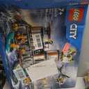 LEGO City Police Prison Island Building Set, Birthday Gift for Boys and Girls Ages 7 Plus, Imaginative Play, Helicopter Toy, Boat Toy and Dinghy, 7 Minifigures with Dog and Shark, 60419