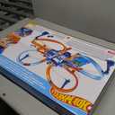 Hot Wheels Track Set with 1:64 Scale Toy Car, 4 Intersections for Crashing, Powered by a Motorized Booster, Criss-Cross Crash Track