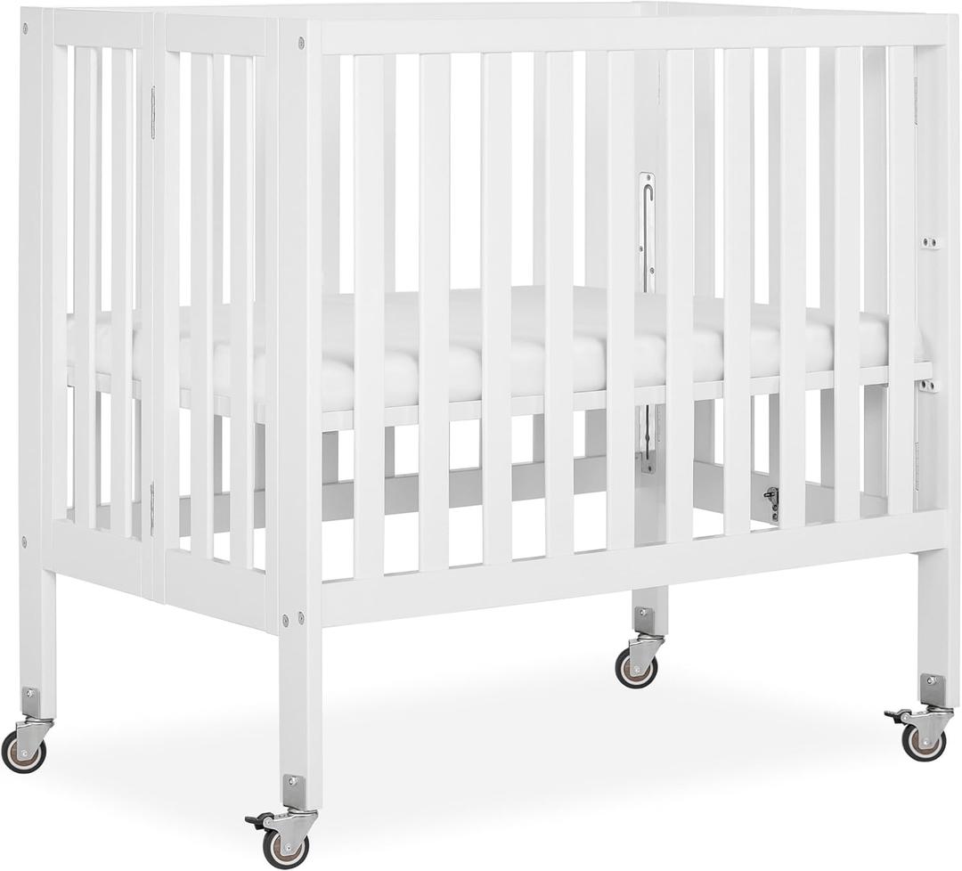 Dream On Me Jett Mini Folding Baby Crib in White, GreenGuard Gold & BSA, Lightweight & Portable, Patented Flat Folding System for Small Spaces & Travel, 1.5” Mattress Pad, 3 Heights, Safe Wheels, 38"L x 26"W x 36"H
