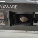 Farberware 1.1 Cu. Ft. Countertop Microwave Oven 1000 Watts Power, Auto Cook Settings, Defrost, Easy Clean and Child Safety Lock - White