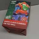 6FT Christmas Inflatable Decorations Hanging Santa Built-in Bright LEDs, Climbing Santa Claus with Gift Bag Christmas Roof Blow Up Yard Inflatables Decoration for Window Wall Outdoor Xmas New Year