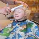 Cobahom Kids Hair Cutting Cape 47.3"31.5'' Professional Barber Cape Child Cartoon Hairdresser Apron with Adjustable Closure, Clips, Double Edge Razor,Neck Duster Brush (Voyage)