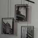 Umbra Exhibit Wall Frame with Metal Rod for Hanging-Rimless Design-Suitable for Living Room, Bathroom, Bedroom, Entryway and More, Black 8" x 10"