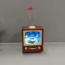 Retro Action Musicals by Roman Action Musical Lighted TV Revolving Train 9-Inch