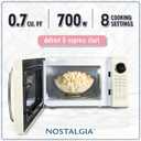 Nostalgia Retro 700W Microwave Oven 0.7 Cu Ft Capacity Child Safety Lock, 8 Auto-Cook Settings Countertop Kitchen Appliance Ivory