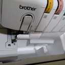 Brother Serger, 1034D, Heavy-Duty Metal Frame Overlock Machine, 1,300 Stitches Per Minute, Removeable Trim Trap, 3 Included Accessory Feet, White