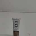 COVERGIRL Clean Invisible Foundation Makeup, Dewy & Glowy Natural Finish, Buildable Coverage, Skin-Like Smooth Look, Vegan, Classic Tan, 1oz