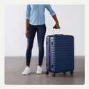 Amazon Basics 30" Hardside Large Checked Luggage with Multi-directional Wheels, Expandable for Up to 15% More Space, Scratch-Resistant Hardshell, Navy Blue