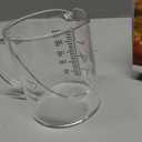 Patikil 250ml Glass Measuring Cup, 3.3 Borosilicate Graduated Black Printed Scale Liquid Measure Cups Beaker with Glass Lid and V-Shaped Spout for Kitchen, It's a Crack On The Side