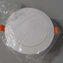 Circular disc-type air vent with integrated filter, for installation on ceilings, walls, or in suspended ceiling ventilation systems