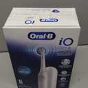 Oral-B Rechargeable Electric Toothbrush, iO Limited Simple Clean, 3 Cleaning Modes, Automatic Pressure Sensor to Protect Gums, Travel Case, White (1 Count (Pack of 1))