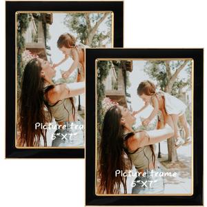5x7 Black Enamel Picture Frames - Metal Gold Edge - Cute Frame for 5 x 7 Inch Photos Pictures Artwork - Real Glass - With Tabletop Easel Stand - Hanger for Wall Mount Display (2 Pack)