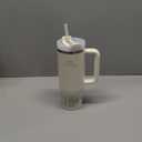 STANLEY Quencher H2.0 Tumbler with Handle and Straw 30 oz | Flowstate 3-Position Lid | Cup Holder Compatible for Travel | Insulated Stainless Steel Cup | BPA-Free | Cream 2.0