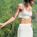 Panadila Womens 2 Piece Skirt Set Workout Outfits Tennis Skorts with Built-in Shorts and Sports Bra Gym Yoga (White, XS)