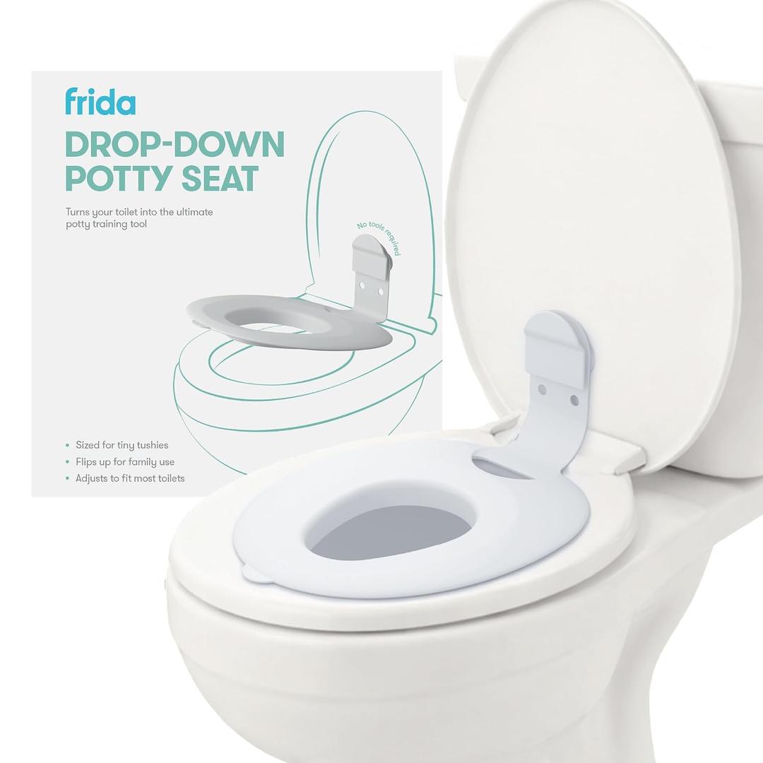 Frida Baby Drop Down Potty Seat, Potty Training Seat for Toddlers, Attaches Securely to Adult Toilet, Flips Up or Stays Down for Kid Ready Access, Easy to Clean, Secure, Stable & Easy to Install