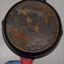 Lodge Cast Iron Skillet with Red Silicone Hot Handle Holder, 10.25-inch