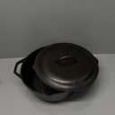 Lodge 7-Quart Cast Iron Dutch Oven  Made in USA, Pre-Seasoned, PFAS-Free & Non-Toxic, Heat-Treated, Induction Compatible, Self-Basting Lid, Durable Multi-Use Cooking Pot for Oven to Table