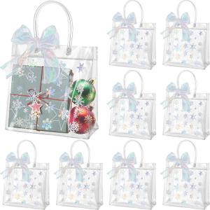 Henoyso 24 Pcs Snowflake Clear Gift Bags Winter Frozen Party Favors Bags Christmas Plastic Candy Goodie Treat Tote with Handles and Ribbon 7.8 x 7.8 x 3.1 PVC Gift Wrap Tote(Laser Silver)