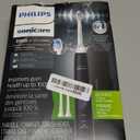 Philips Sonicare ProtectiveClean 5300 Rechargeable Electric Toothbrush, with Pressure Sensor, 3 Cleaning Modes, SmarTimer and QuadPacer, with 2 Bonus Brush Heads, Travel Case, Black, Model HX6423/34