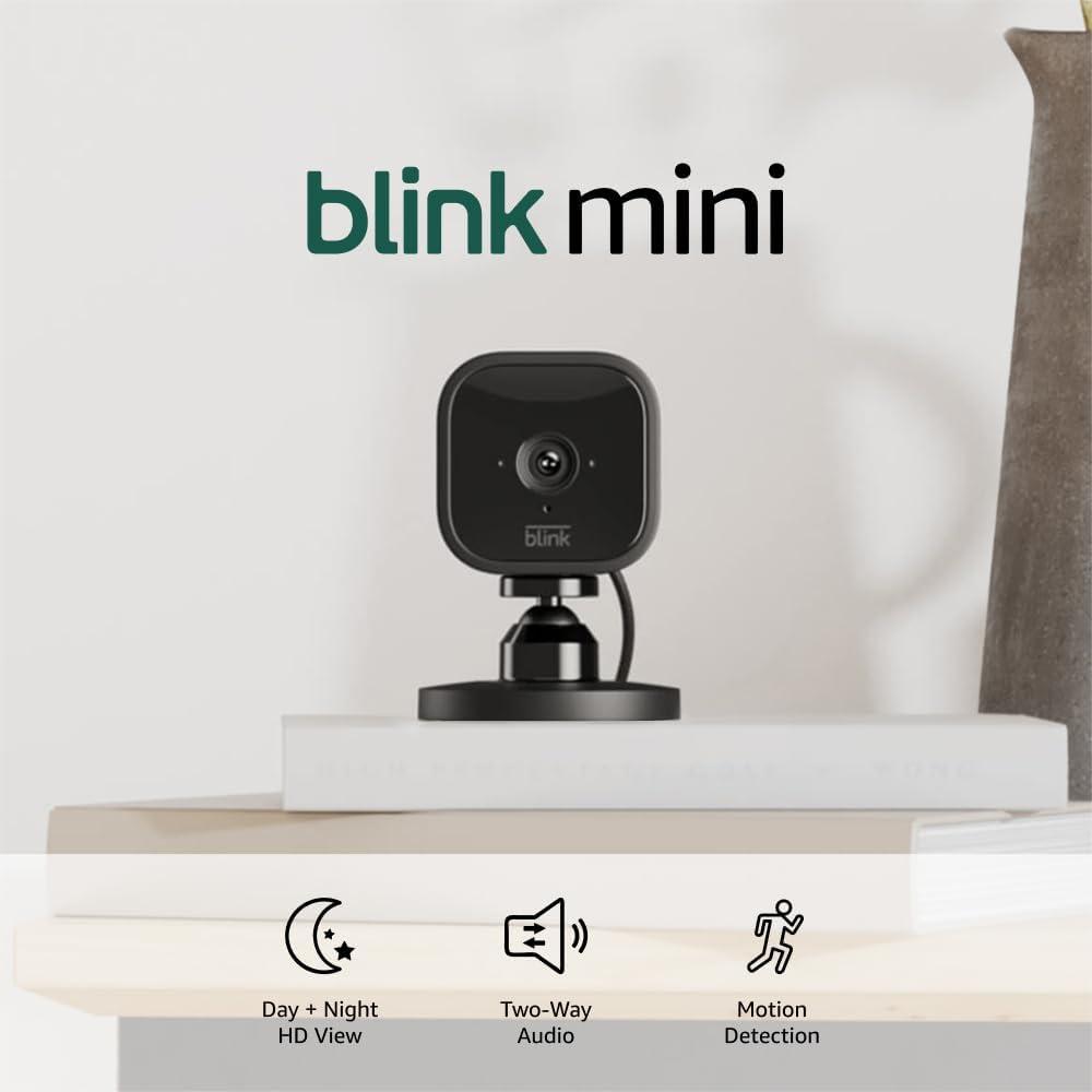 Blink Mini - Compact indoor plug-in smart security camera, 1080p HD video, night vision, motion detection, two-way audio, easy set up, Works with Alexa 2 cameras (Black)