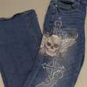 HOT TOPIC SKULL CROSS DESIGN JEANS, SIZE 5.