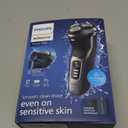 Philips Norelco Shaver 3900 Series, Wet and Dry Electric Shaver, P-Cap, Travel Pouch, Charging Stand, Storm Blue, Model S3341/92 (Silver New)