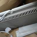 Bionaire Window Fan with Reversible Airflow Blades 3-Speed Settings, Programmable Thermostat, LED Display, Remote Control, Fits 2436" Windows, No Assembly Required